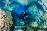 The diver in the Sintzi cave. The continuous flow of the fresh water made the petrification so sharp.